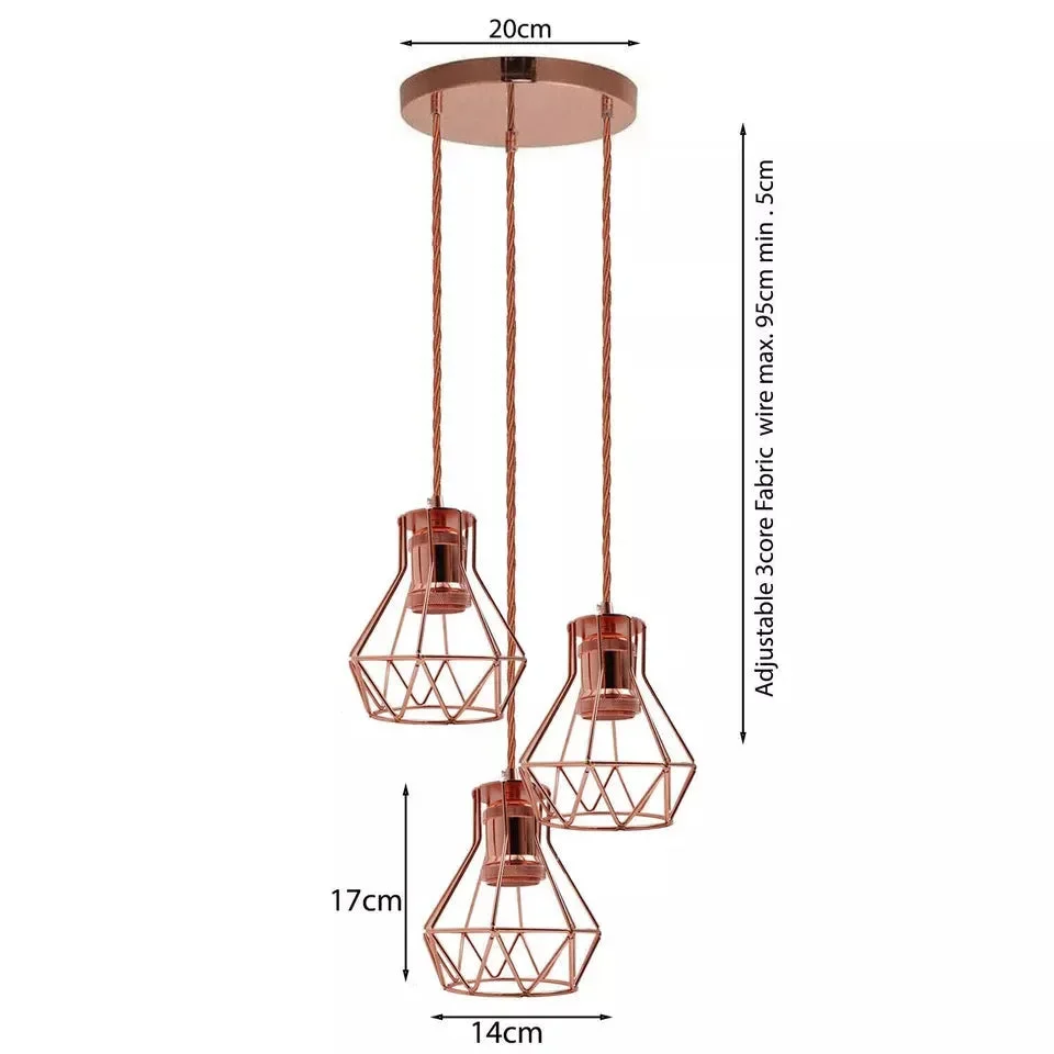 Three rose gold vintage industrial E27 hanging lights with fabric cables and metal shades in a cluster pendant design