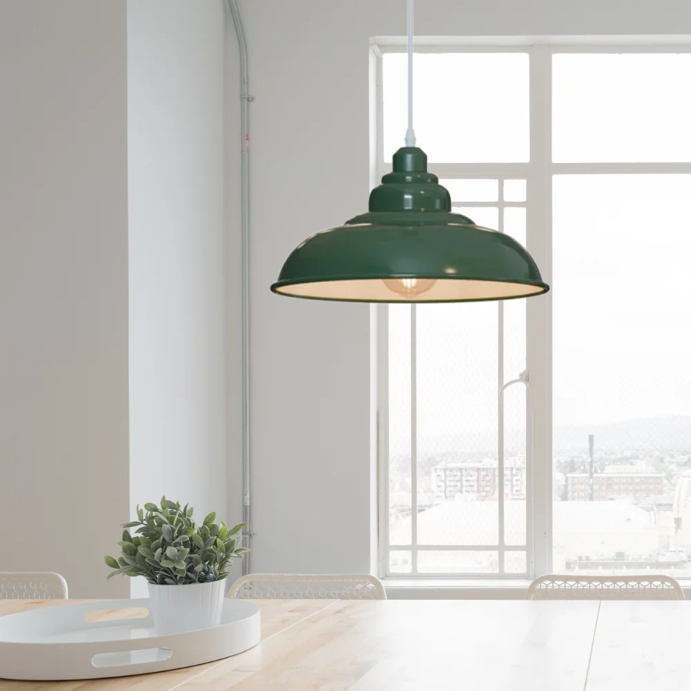 Vintage style lighting with a metal shade pendant light hanging from a ceiling, showing its classic retro design and cord length.