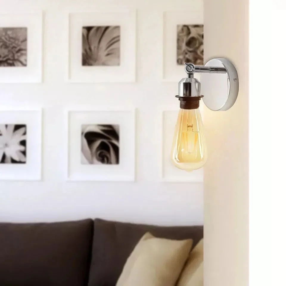 Chrome retro industrial adjustable wall light with metal shade and E27 bulb holder mounted on wall