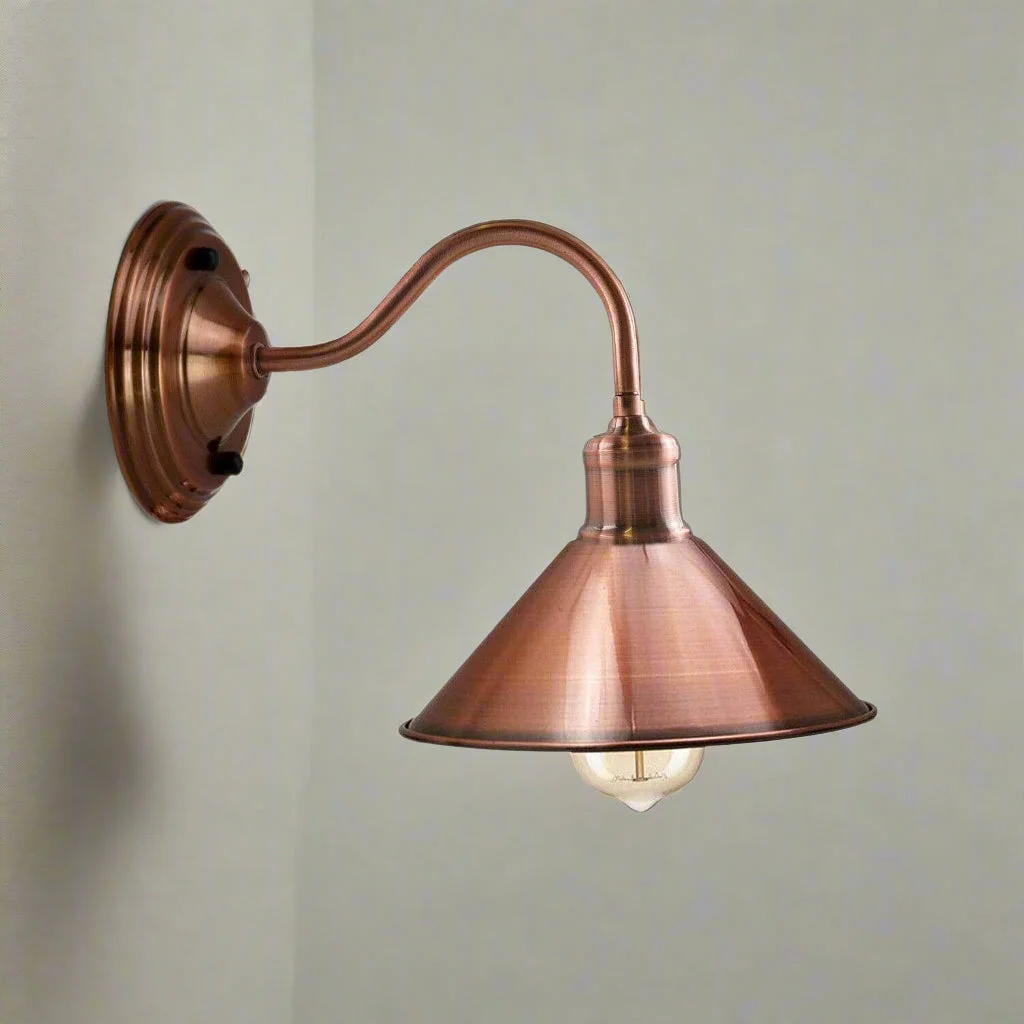 Copper metal wall sconce with cone-shaped shade and curved swan neck arm, industrial style for indoor wall mounting