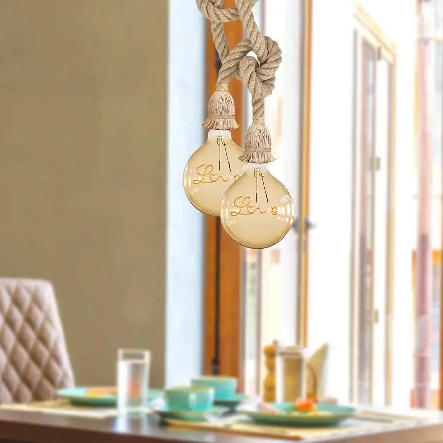 Double head pendant light with two E27 sockets, hemp rope cords, and metal fixtures in vintage industrial style