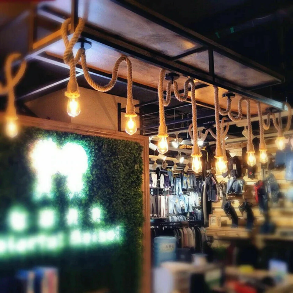 Double head dimmable rope pendant light with natural hemp rope and metal fixtures hanging from ceiling, adjustable height