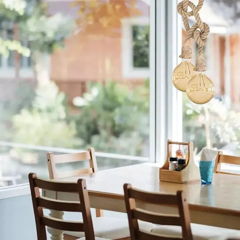 Double head hemp rope pendant light with two adjustable E27 sockets hanging from natural hemp ropes against white background
