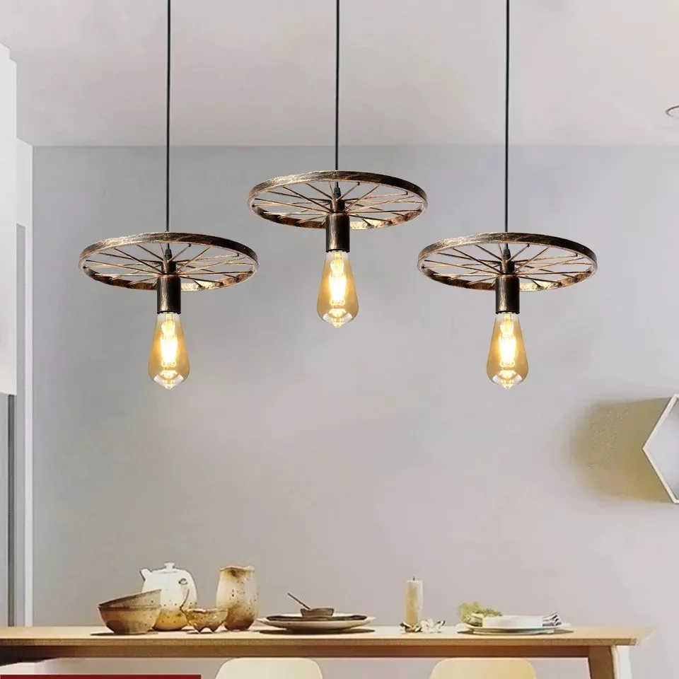 Black vintage ceiling pendant light with three hanging bulbs in a bike wheel metal frame design