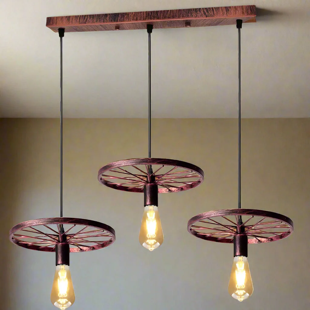 Black vintage 3-way pendant light with bike wheel design and three hanging bulbs, ceiling mounted with adjustable cables