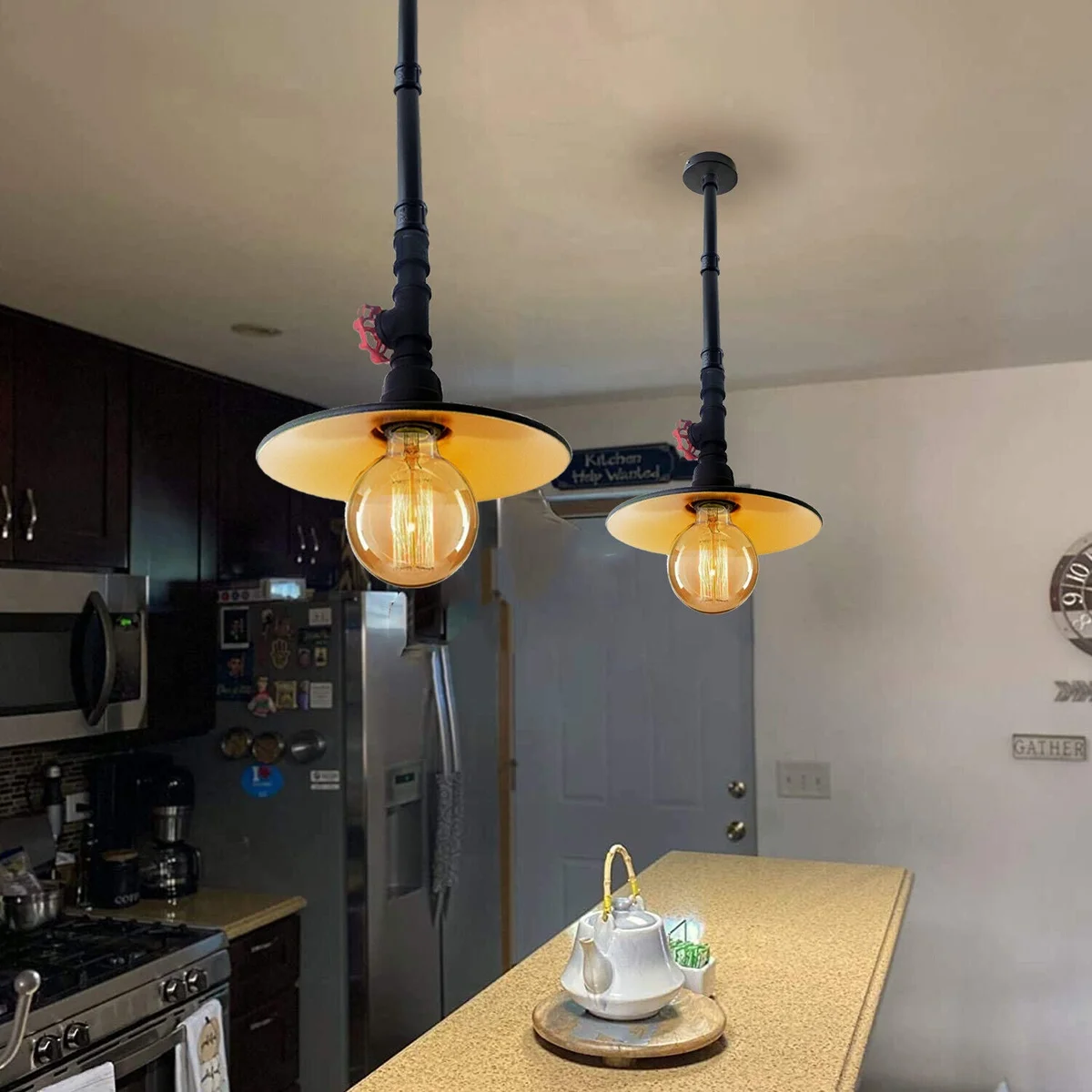 Black galvanized metal ceiling light fitting with gold interior shade, industrial steampunk pendant design hanging from ceiling