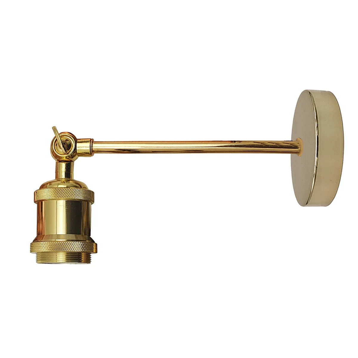 Vintage industrial E27 wall light with adjustable swivel arm in antique brass finish mounted on a wall