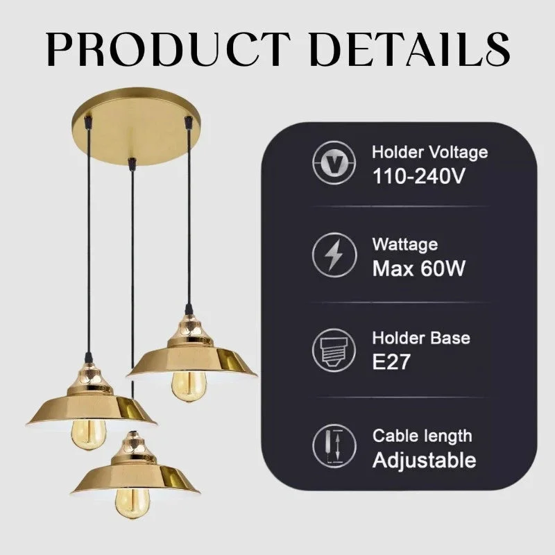 Three yellow brass vintage industrial cluster pendant lights with adjustable cables shown hanging at staggered heights