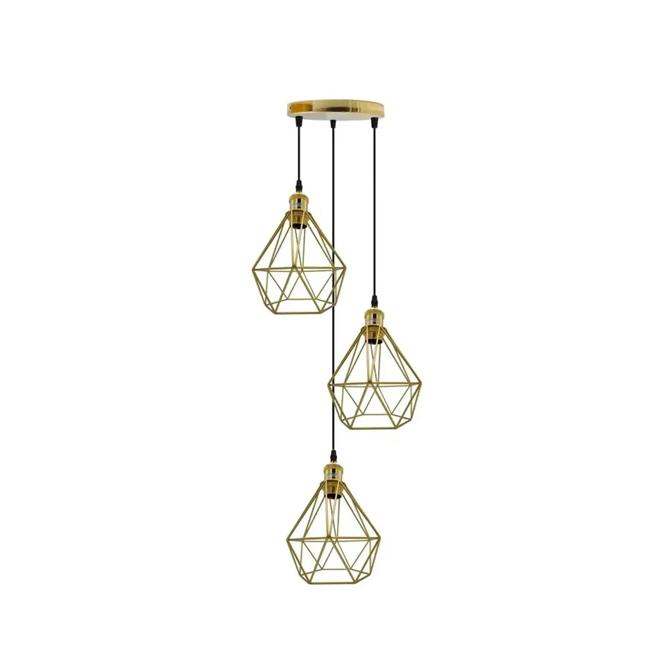Three adjustable french gold pendant lights with metal cage shades hanging from ceiling in industrial style cluster design