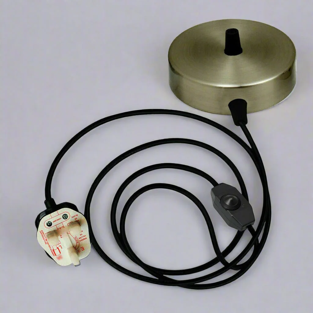 Satin nickel wall lamp with plug-in cord and dimmer switch mounted on a white wall background