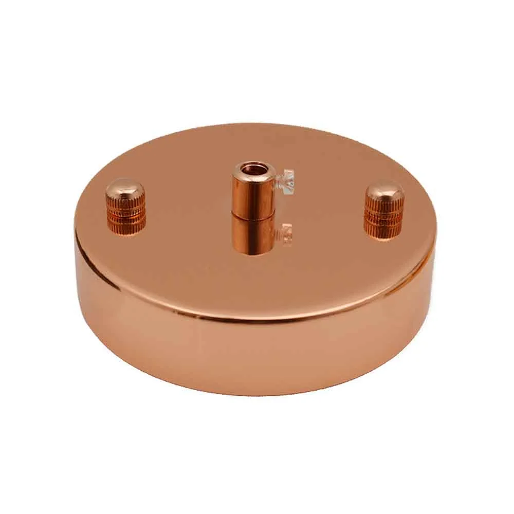 Round metal ceiling rose in rose gold finish, 100mm diameter, designed for pendant light fittings indoors