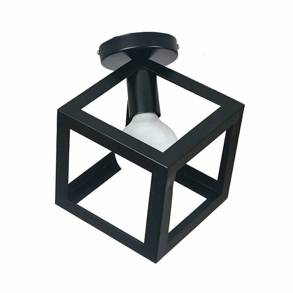 Black industrial flush mount ceiling light with geometric metal cage and included bulb, suitable for kitchen or cafe lighting