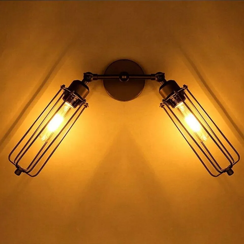 Metal cage wall lamp on wall, black iron frame, adjustable arm, LED bulb inside, industrial style
