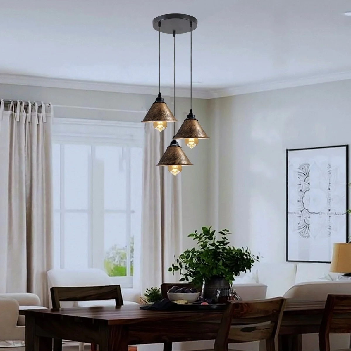 Vintage industrial metal pendant lamp with three brushed copper shades and black ceiling plate hanging from adjustable cords