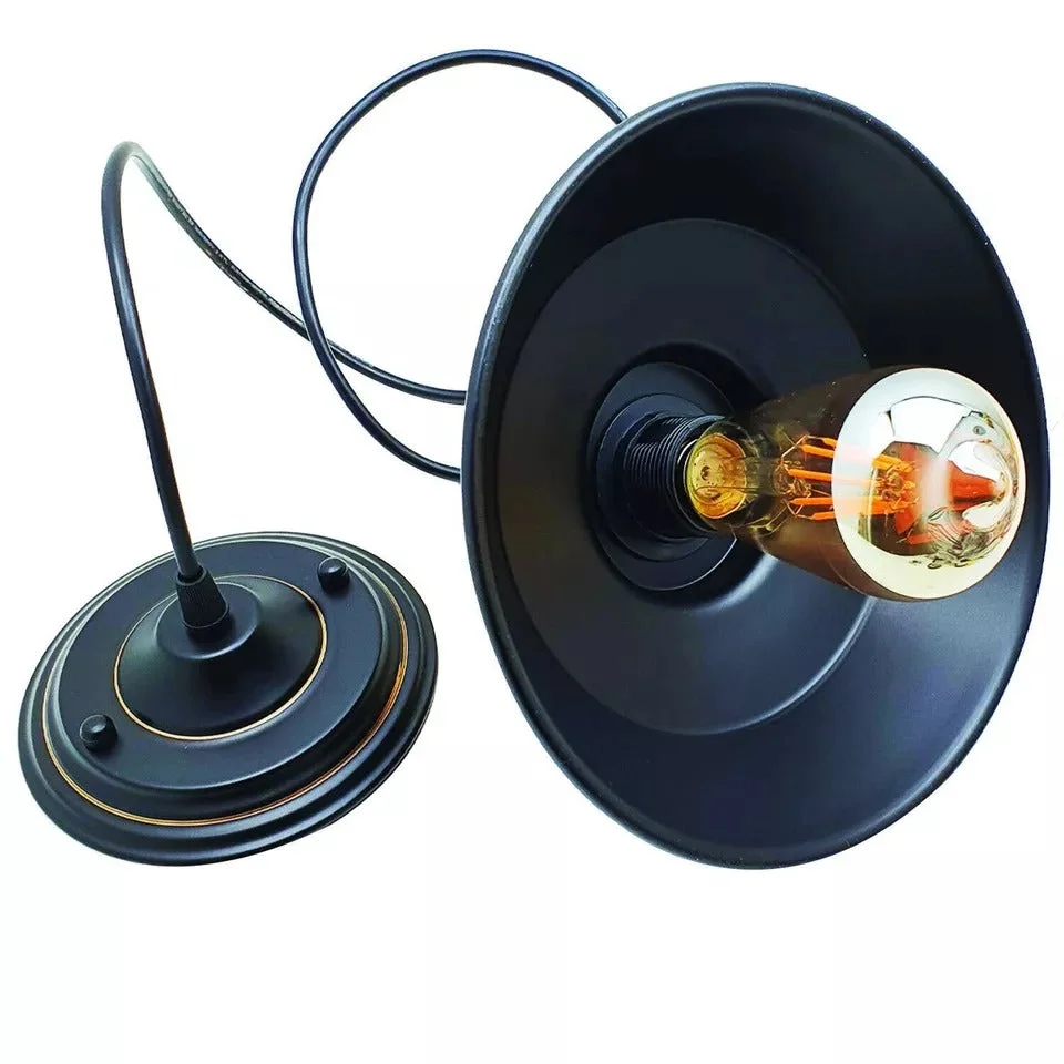 Vintage industrial pendant light with metal shade suspended from ceiling, adjustable PVC cable and 22 cm shade width