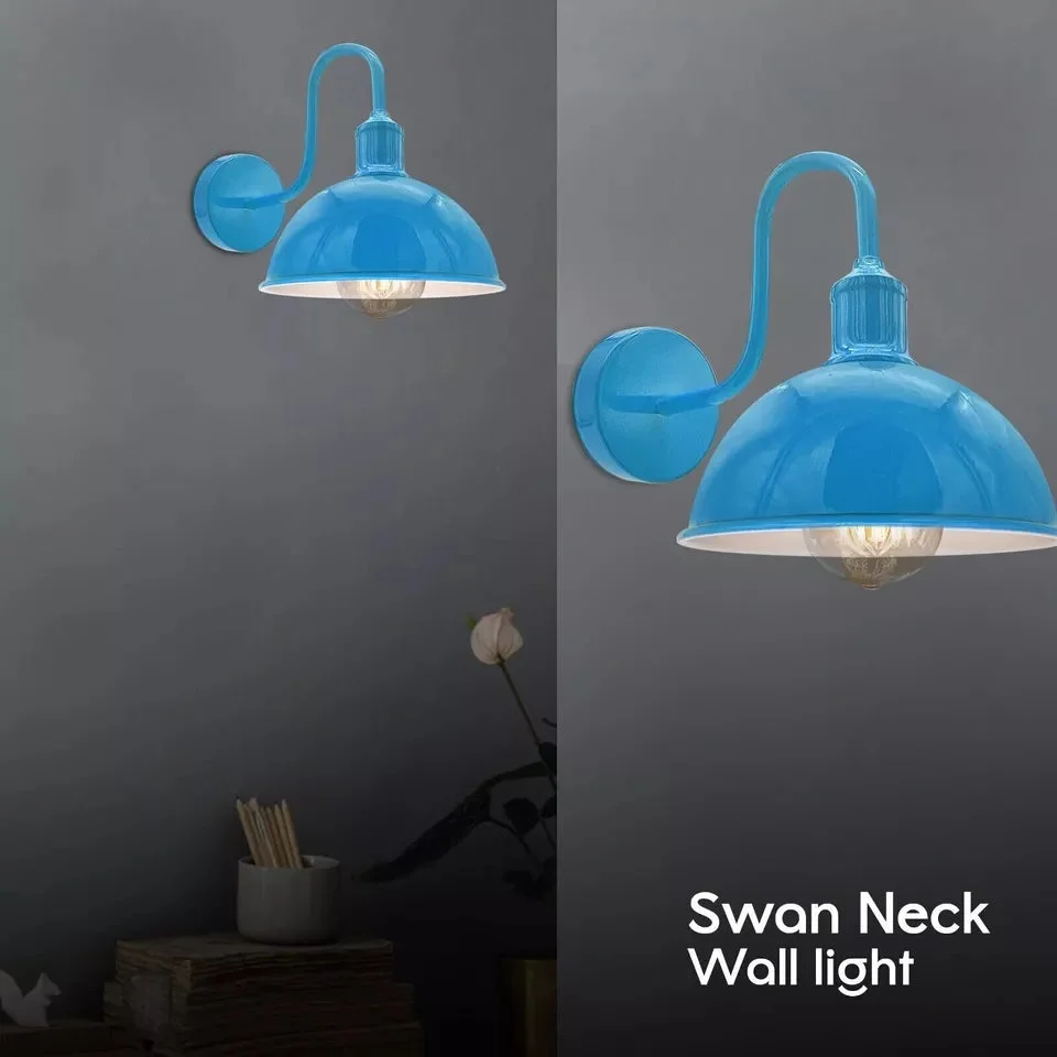 Vintage industrial wall light with dome-shaped black metal shade mounted on a wall, showcasing rustic modern design