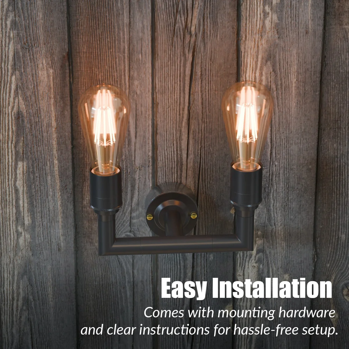 Black industrial wall light with dual E27 fittings mounted on a white wall showing metal conduit pipe design