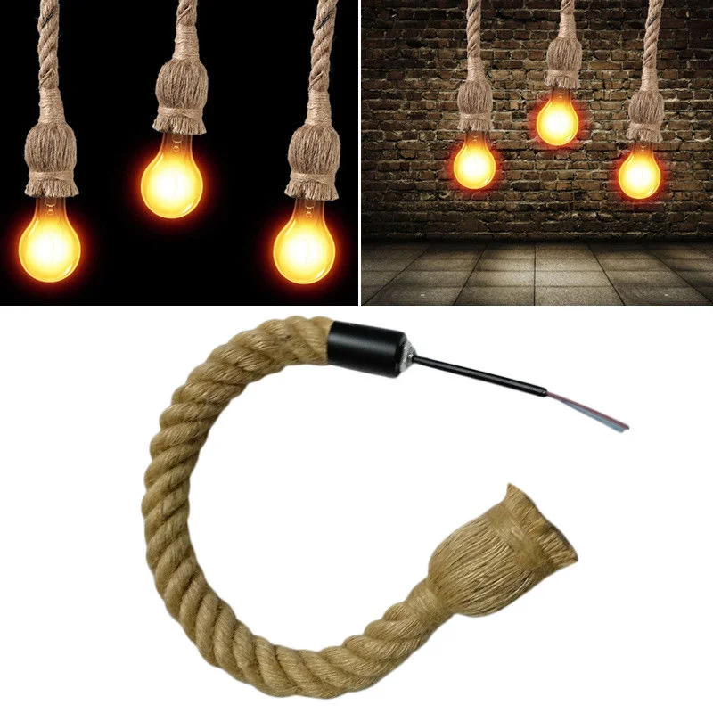 Three vintage hemp rope ceiling lights with copper fittings hanging from a ceiling rose in industrial loft style