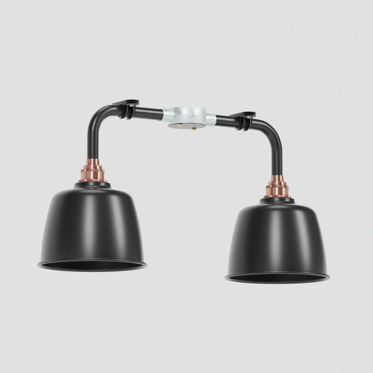Black vintage industrial ceiling light with two angled downlight fixtures and copper fittings on wall mount