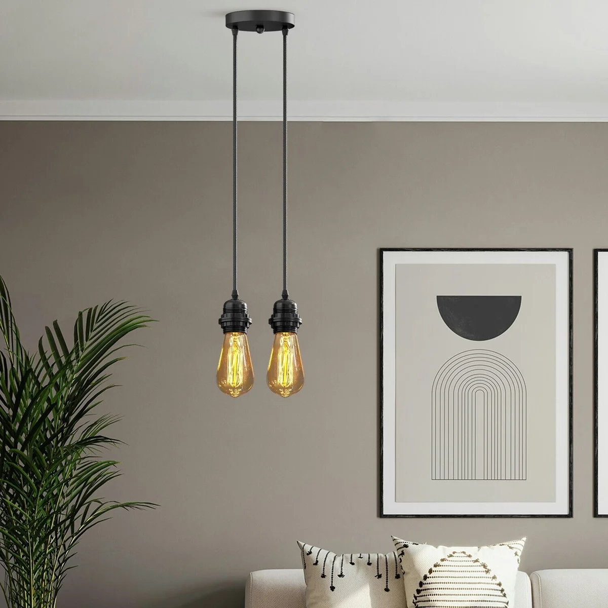 Black twin E27 pendant light holder with adjustable heads, matte black metal frame, and fabric cable hanging from ceiling rose