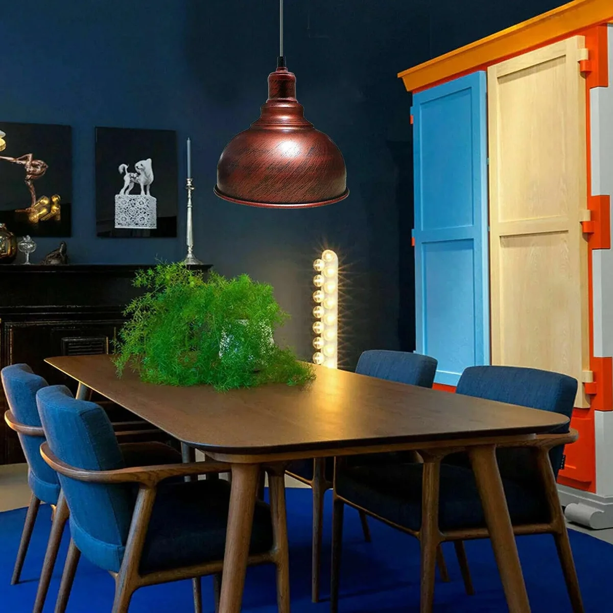 Vintage ceiling pendant light with polished metal finish and warm diffused glow, suitable for indoor use