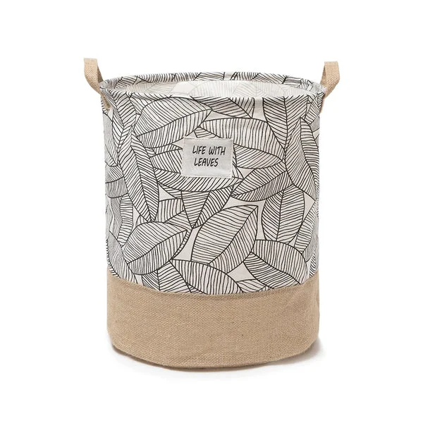 Foldable cotton laundry bag with waterproof lining, standing upright, designed for home storage and dirty clothes.