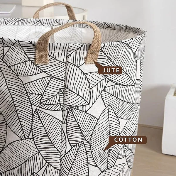 Foldable lightweight laundry organizer made of cotton with waterproof interior, standing empty on a white background