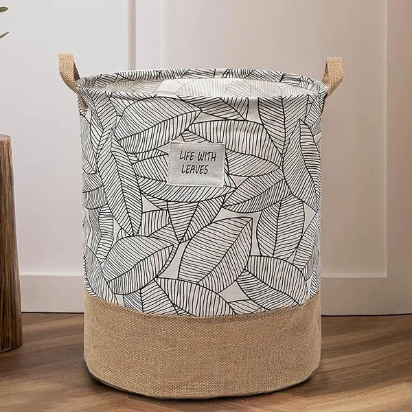 Foldable cotton waterproof laundry basket with handles, standing upright and empty, showing spacious interior and durable fabric