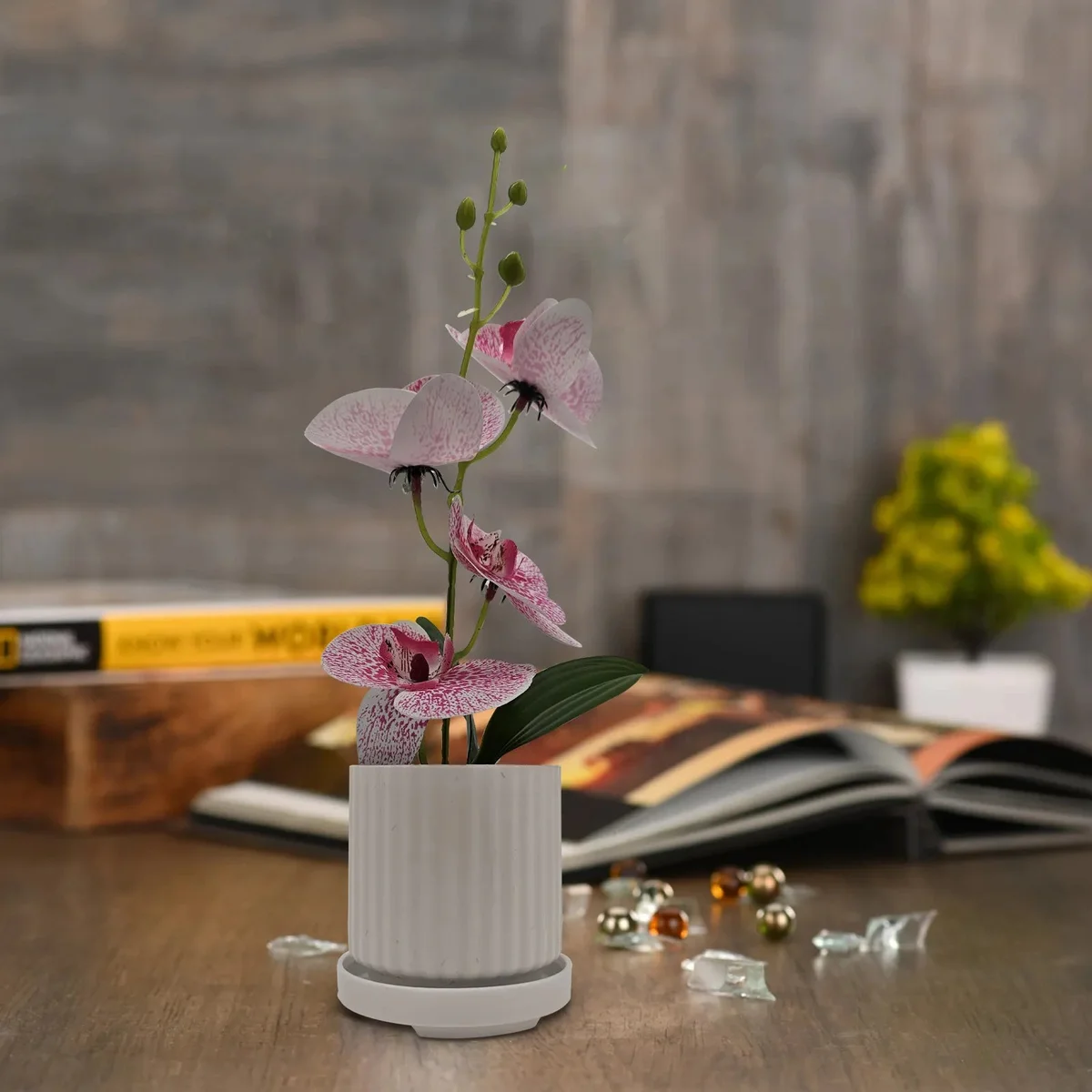 Artificial potted orchid decoration with green leaves in a modern pot, ideal for indoor table display, silk material