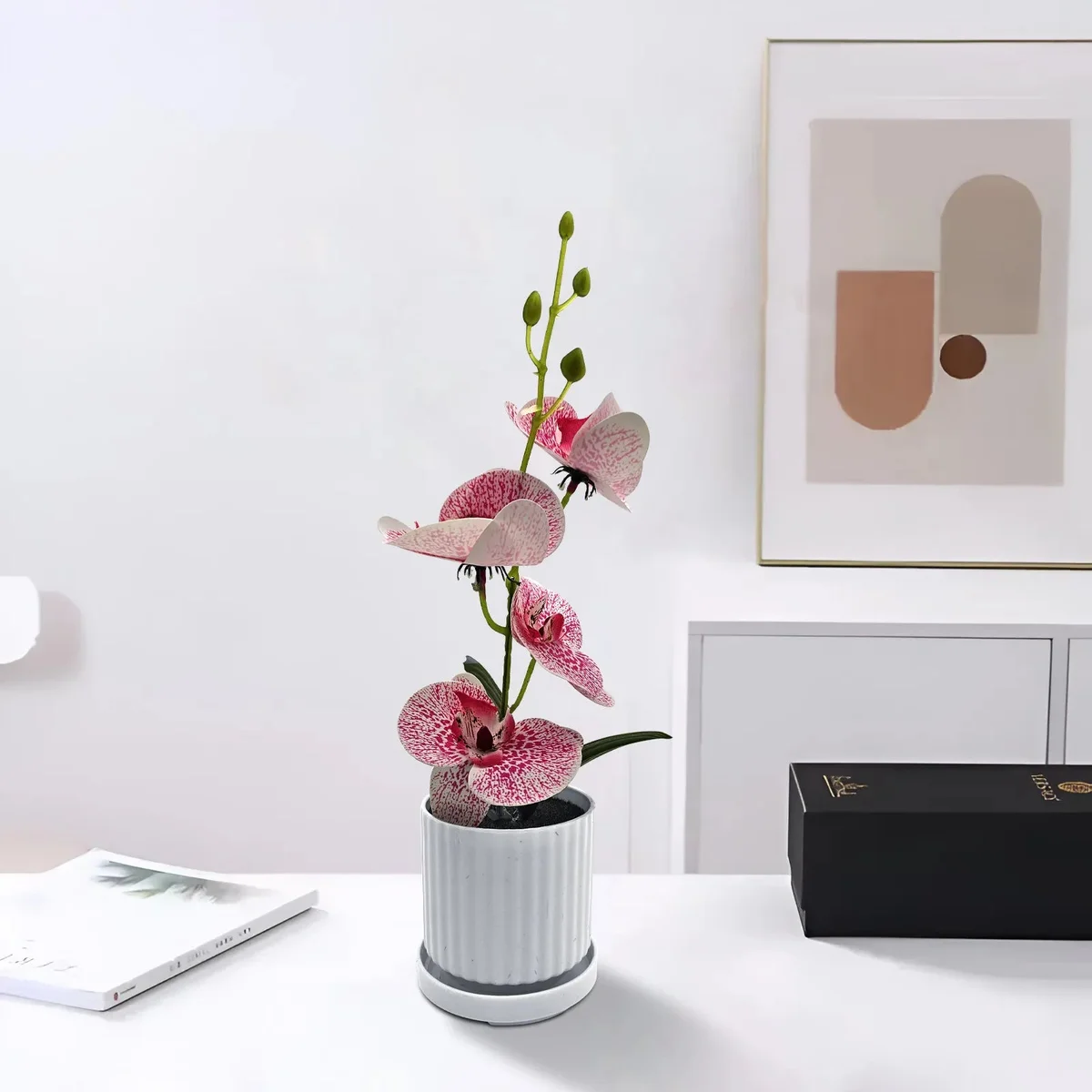 Artificial orchid plant with green leaves in a modern pot, perfect for indoor table decoration, 30cm tall