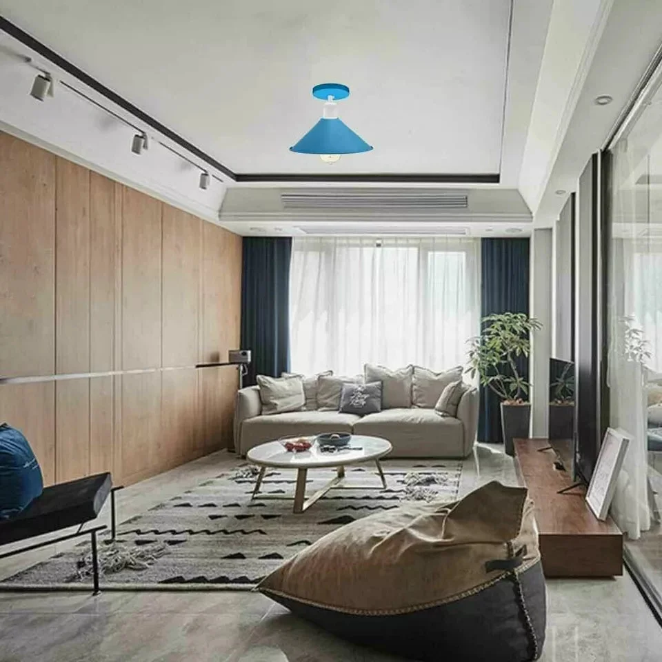 Black metal cone vintage ceiling light flush mounted on white ceiling with visible mounting hardware and cord