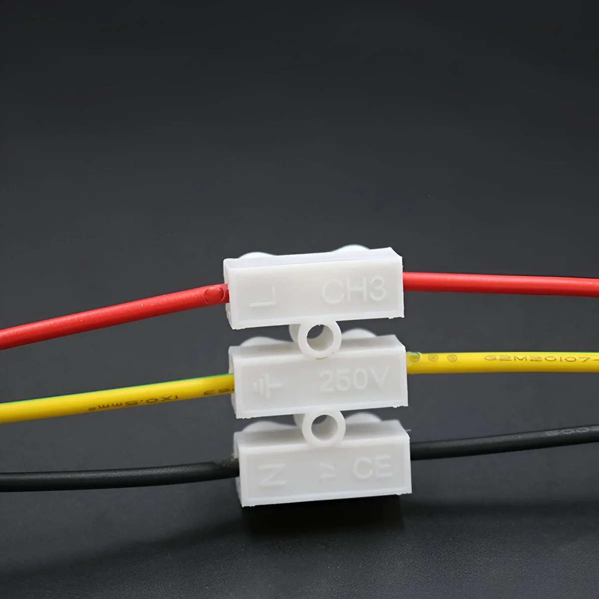 Close-up of red and yellow self-locking wire connectors for quick splice electrical wiring up to 250V