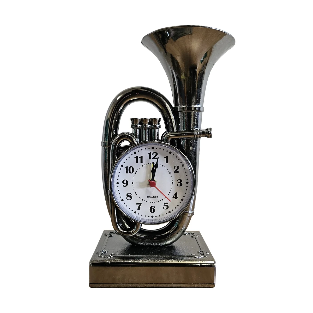Vintage trumpet alarm clock in chrome with glass front, showing classic analogue dial on a white background