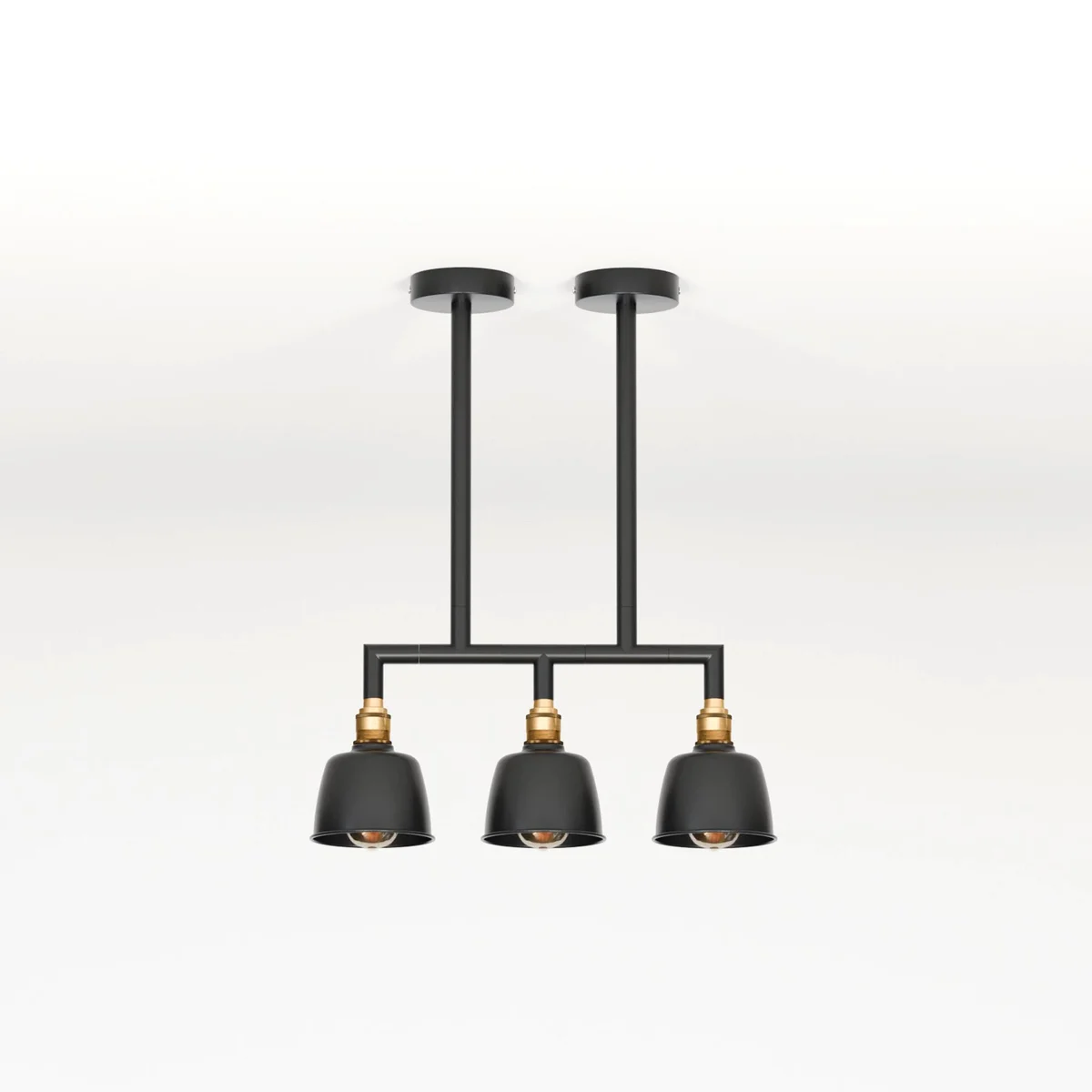 Three-light industrial pendant light with metal conduit pipes and dome shades, ceiling mounted for indoor use