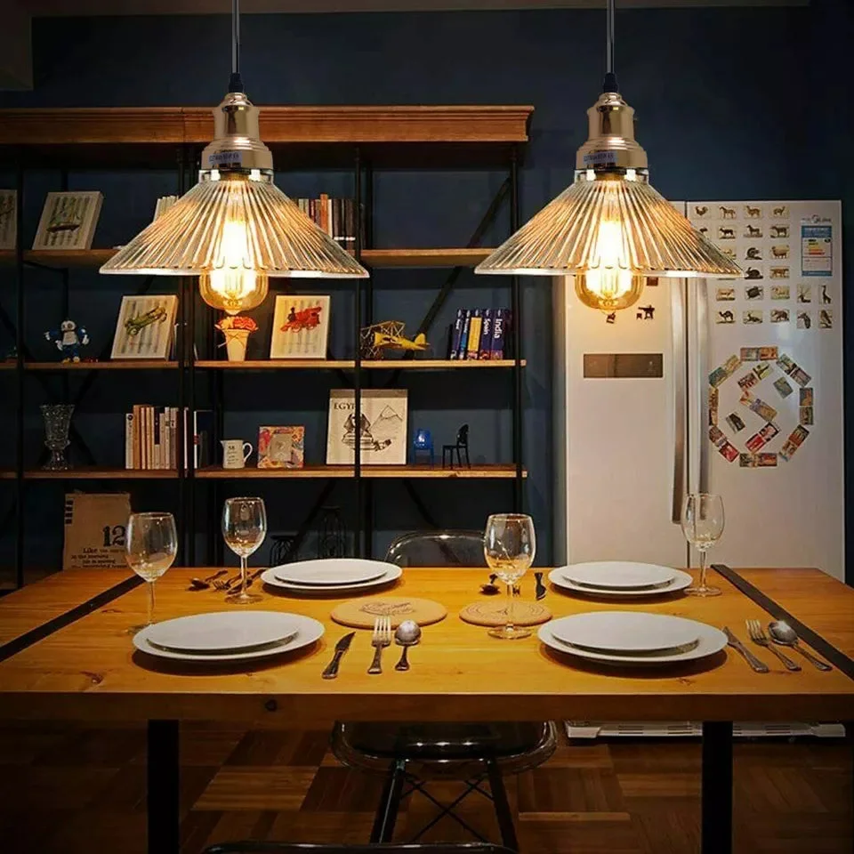 Vintage amber glass E27 bulb pendant light with adjustable ceiling mount and PVC cable in a stylish, space-saving design