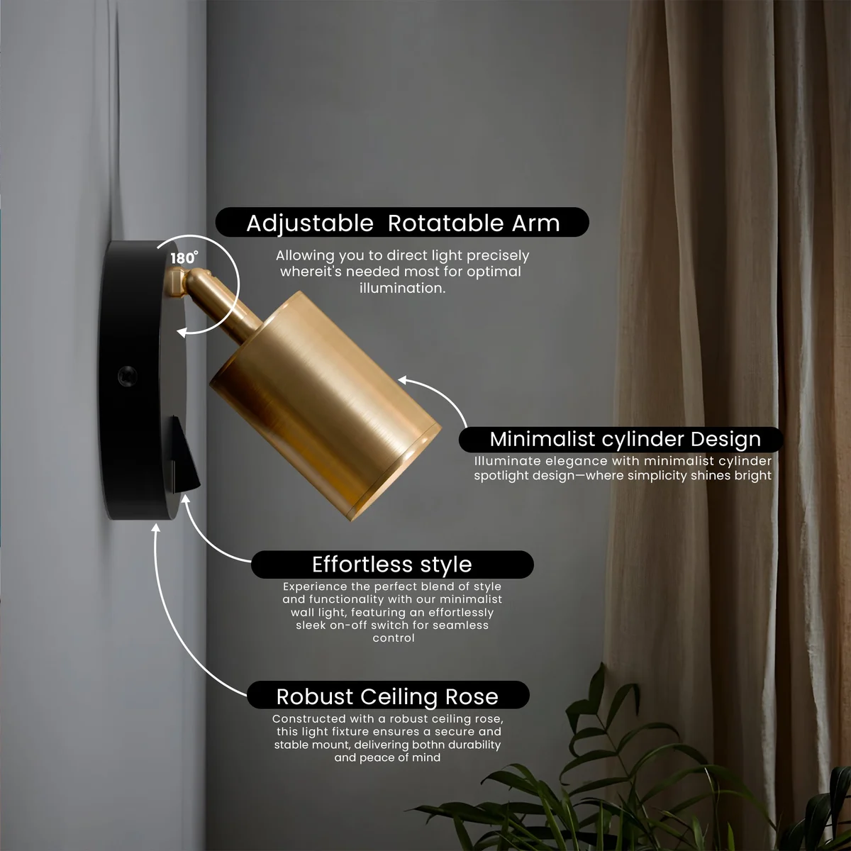 Yellow brass wall light with cylindrical adjustable spotlight and on-off switch mounted on a white wall background
