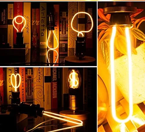 Vintage LED filament bulb with neon-style curved filament in clear polycarbonate E27 dimmable casing glowing warm amber light