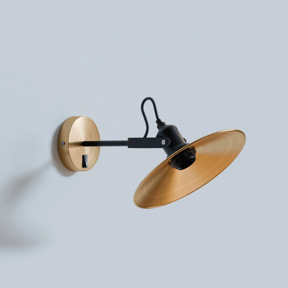 Industrial metal swivel sconce mounted on wall with adjustable 180° rotatable lamp head and E27 bulb socket