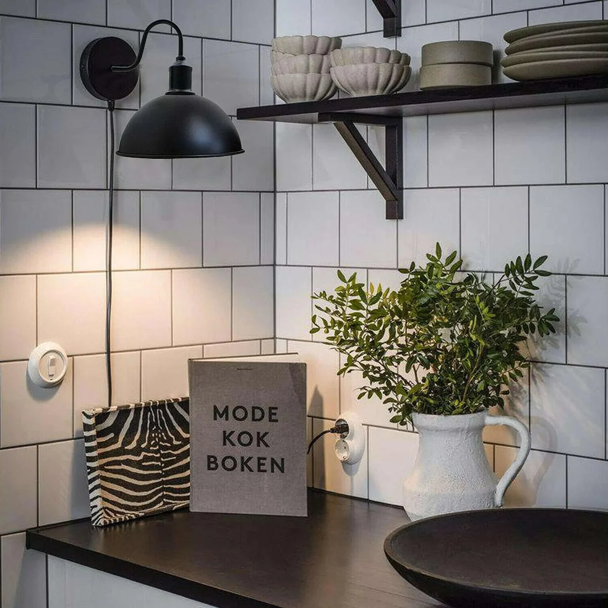 Black dome industrial wall sconce with curved metal shade and swan neck arm, wall mounted indoor light fixture