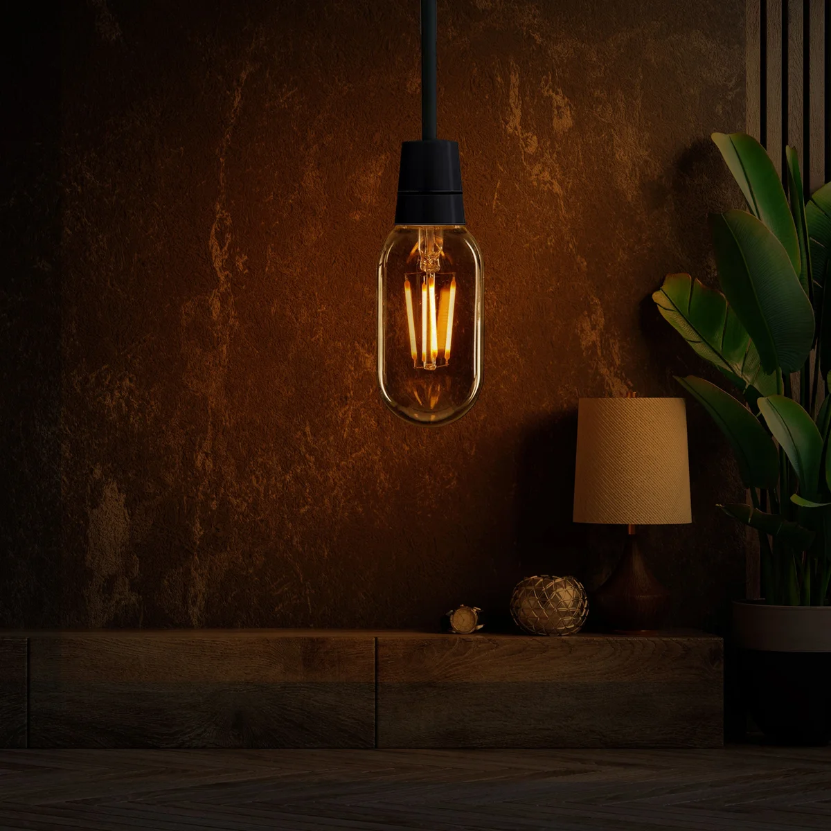 Amber glass dimmable LED filament bulb with E27 base, vintage T45 shape, glowing warm white light at 2700K temperature