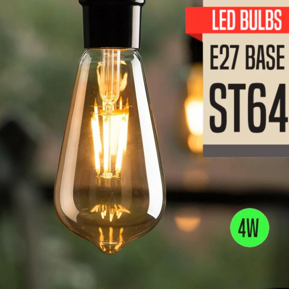 Vintage ST64 E27 4W energy efficient bulb with quad loop filament glowing warmly in a dimmed setting