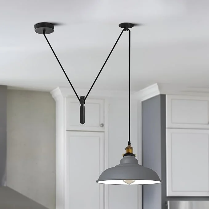 Black industrial ceiling pendant light with one bulb, adjustable 195cm cable, and metal spider design hanging from ceiling
