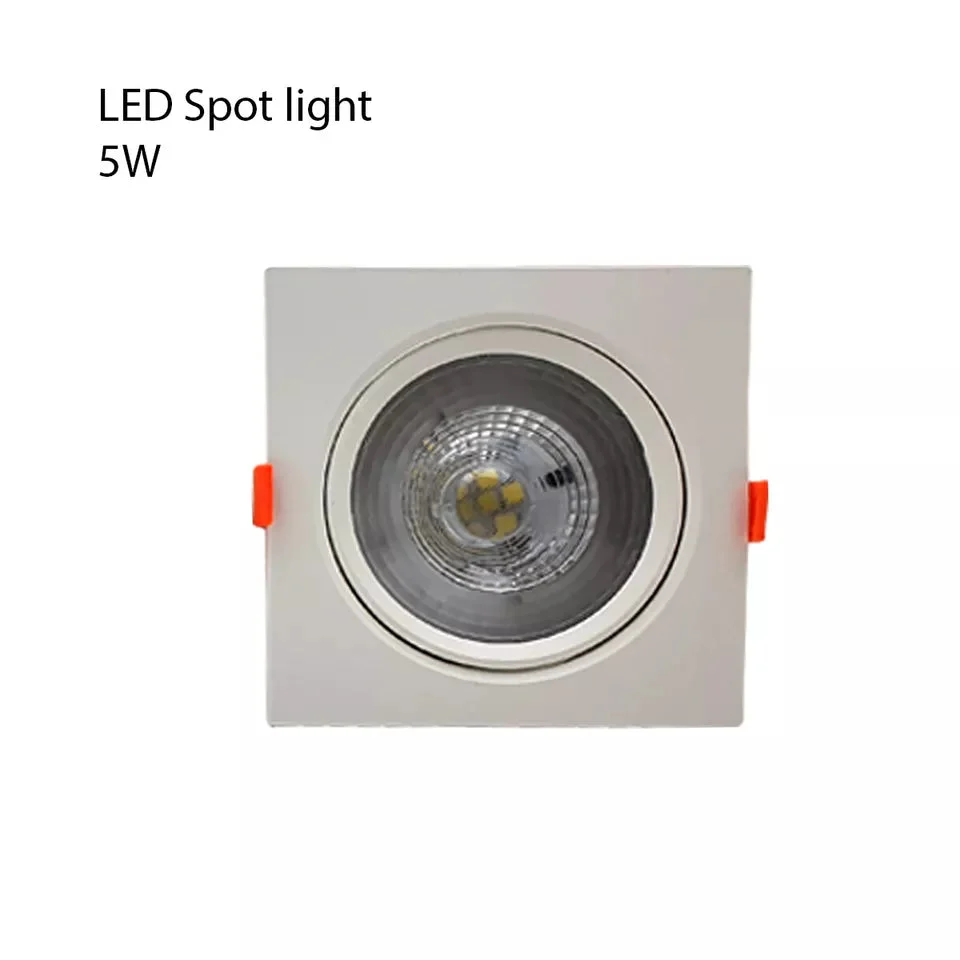 Modern ultra slim recessed LED tilt angle ceiling light installed in a white ceiling, emitting cool white light