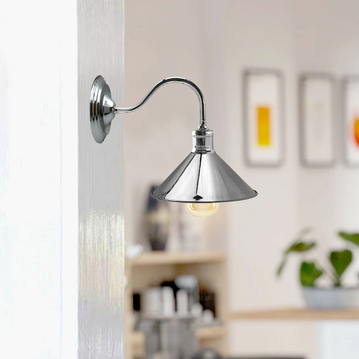Industrial metal cone hardwired wall light with 22cm curved arm and wide-angle conical shade in matte black finish