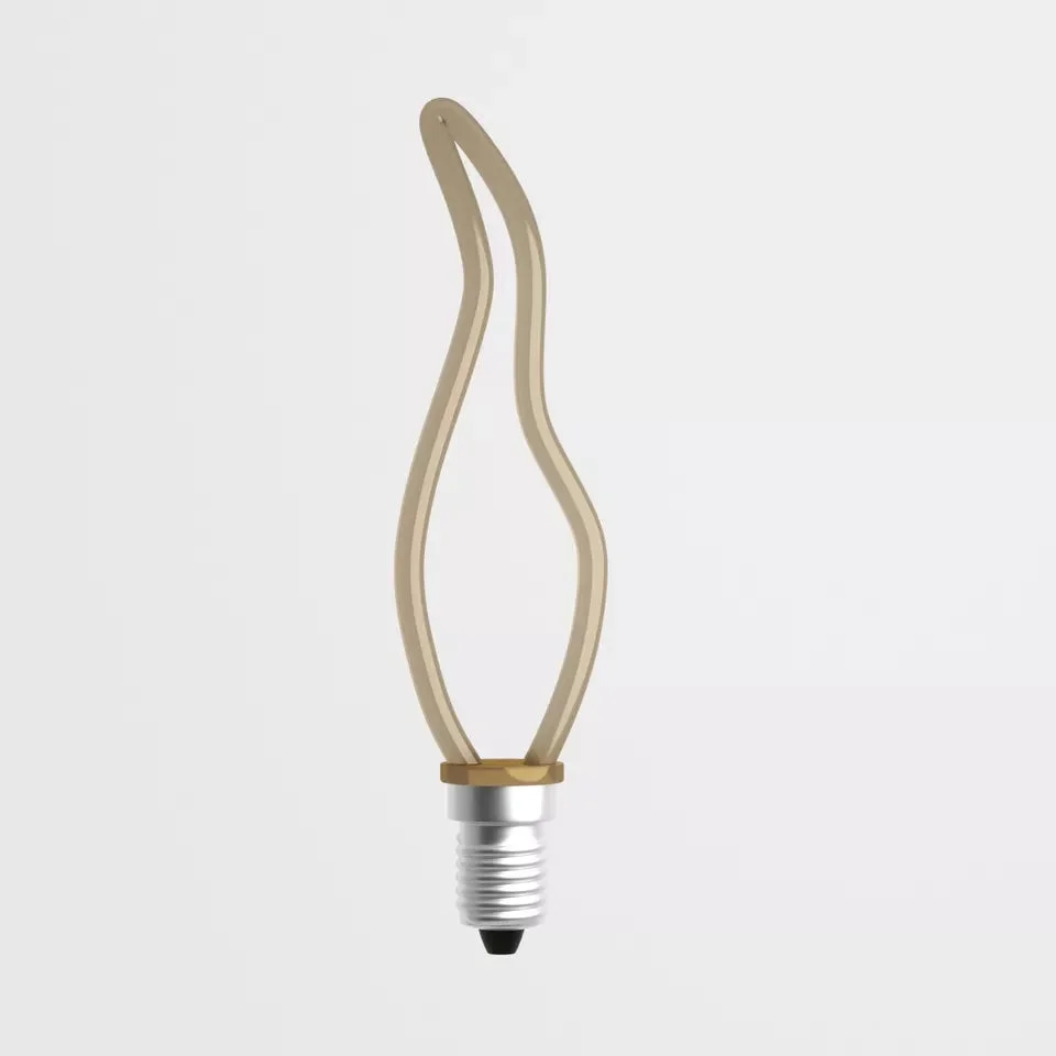 Vintage LED light bulb with Edison screw fitting, warm yellow glow, glass and copper design, suitable for decorative lighting