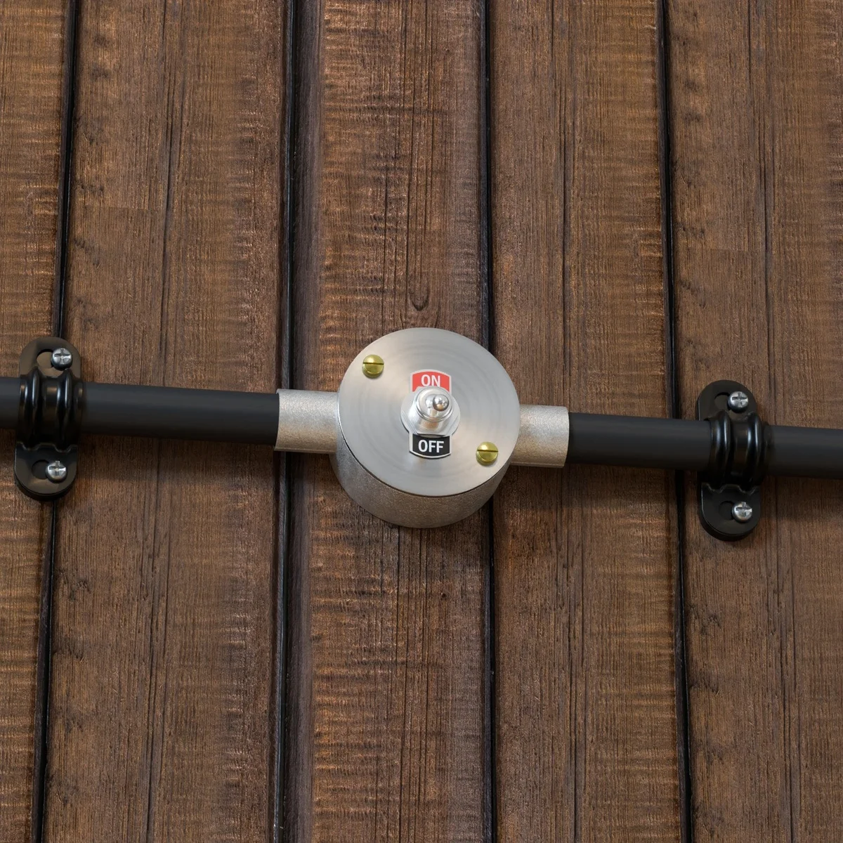 Matte black metal conduit box lid with 14mm center hole and 4mm side hole for 20mm conduit fittings