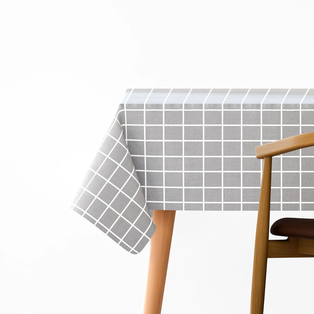 Square 150cm modern washable non slip tablecloth in light grey polyester fabric on wooden table outdoors