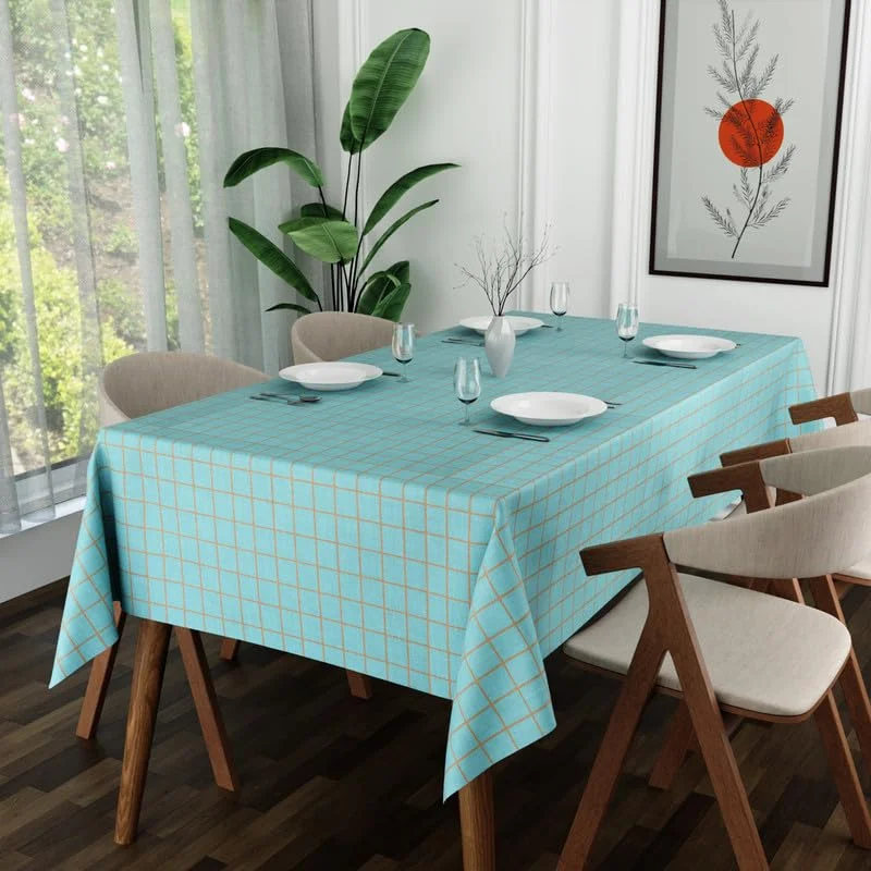 Rectangular polyester tablecloth washable in modern style, 137x183 cm, shown spread on dining table with soft folds