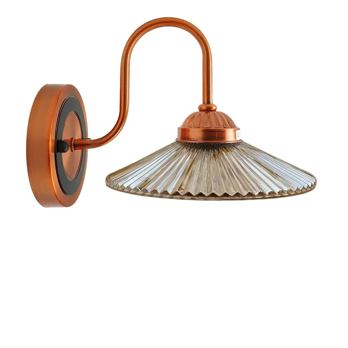 Industrial style wall lamp with amber glass shade and metal cage mounted on a white wall, showing warm light glow