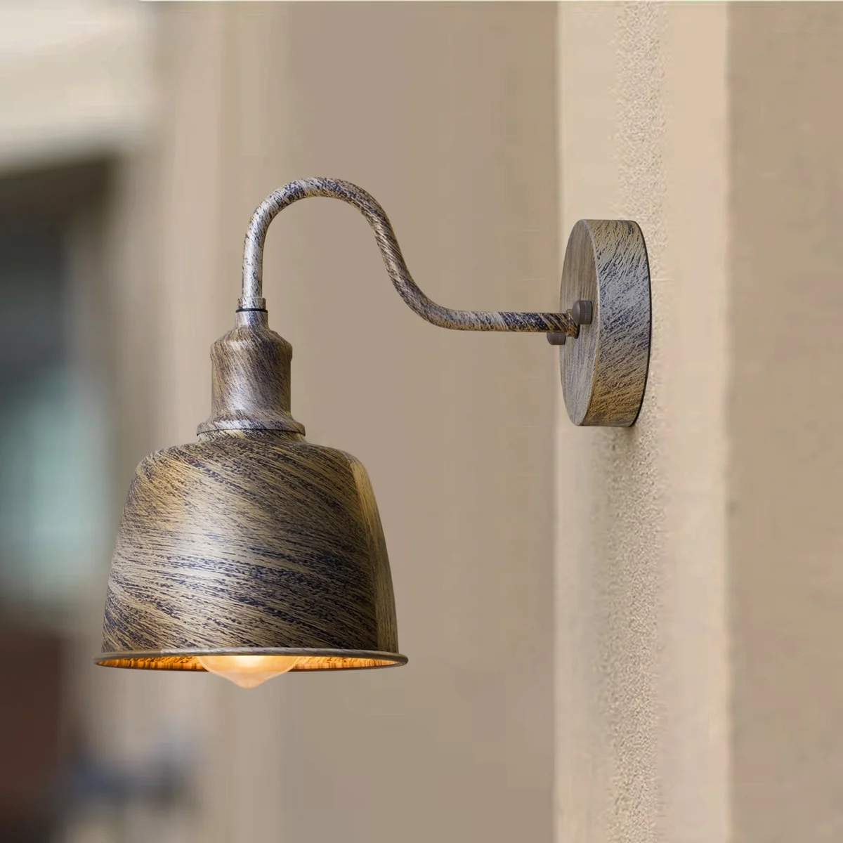 Industrial waterproof wall sconce with bell shade, metal finish, showcasing dimmable outdoor lighting for pathways and patios
